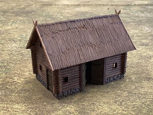 Log Barn double door with thatched roof